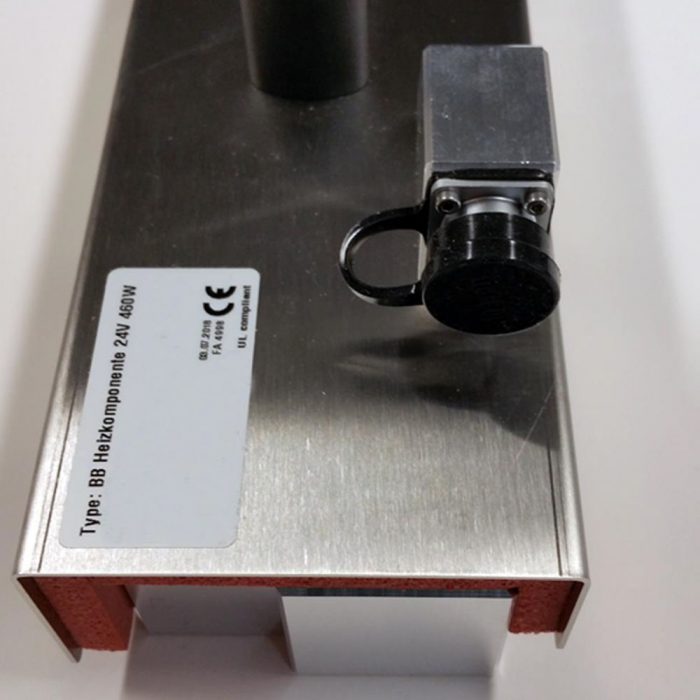 Front block heater for universal depositor detail