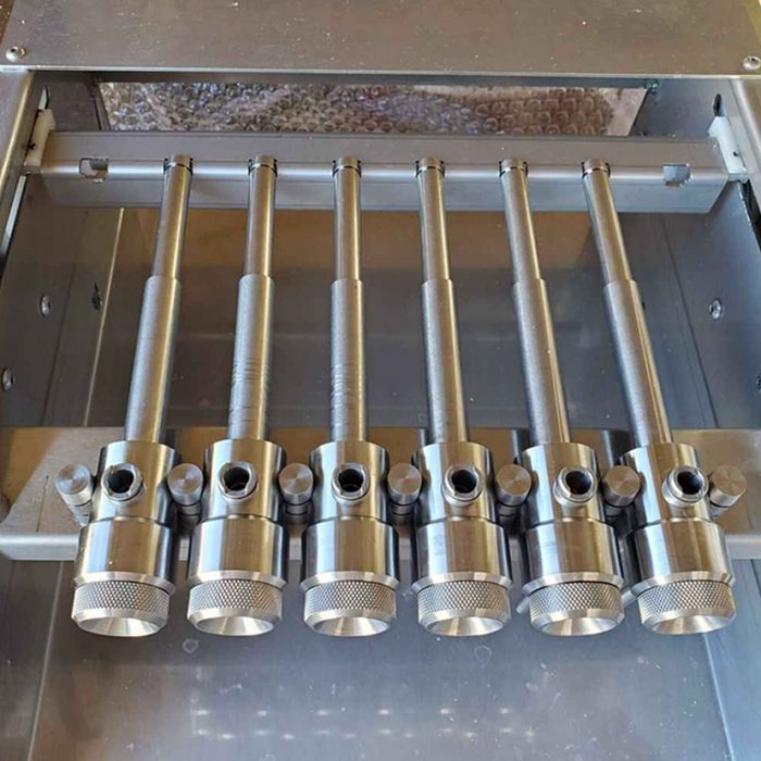 Piston sliding bar for universal depositor